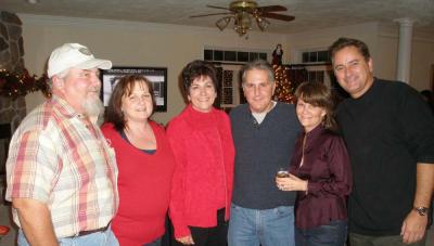The most recent neighborhood gathering was just before Christmas.  Pictured here are Cliff and Lynn Sipe, Trish Ulick, Kenn and Jackie Weitzer, and host Andy Harmond.