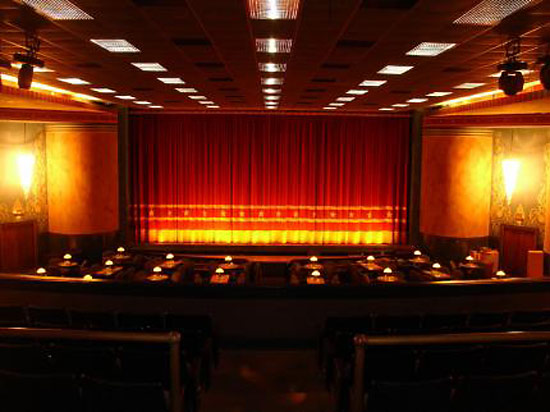Commodore Theatre's red curtain has kept audiences captivated for almost 30 years - Photo courtesy Richard Long
