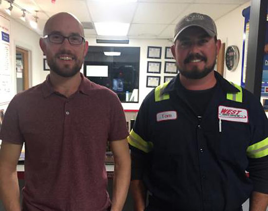 Sons David and Tom West at the front desk of the West Service Center