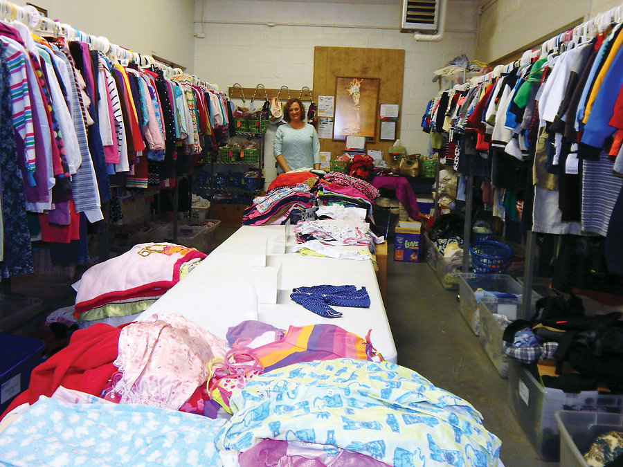 Danielleâ€™s shop is well organized and cozy, doubling as a donation sorting area