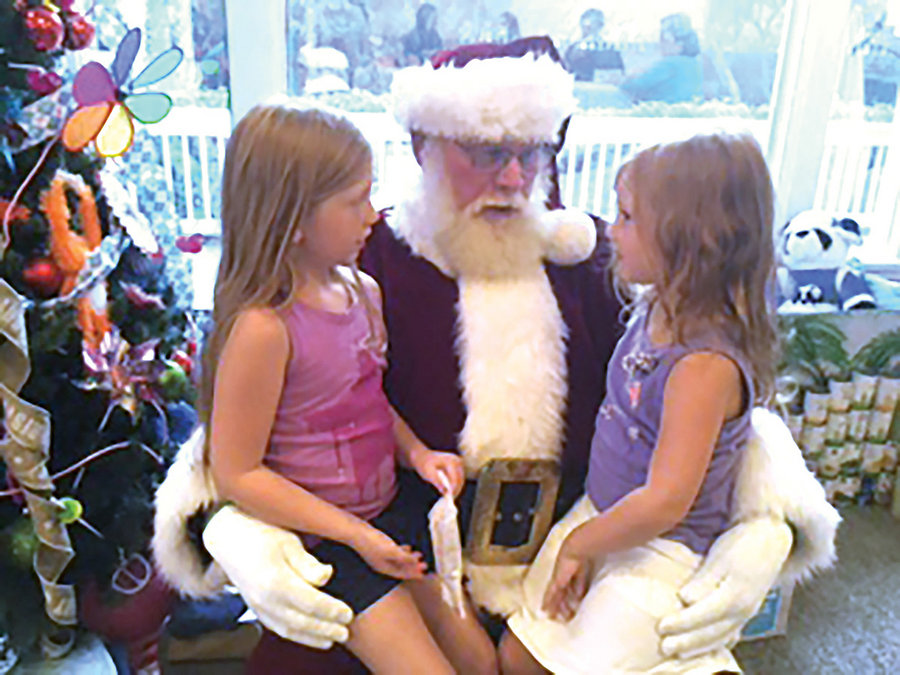 The shelterâ€™s children get a special visit with Santa