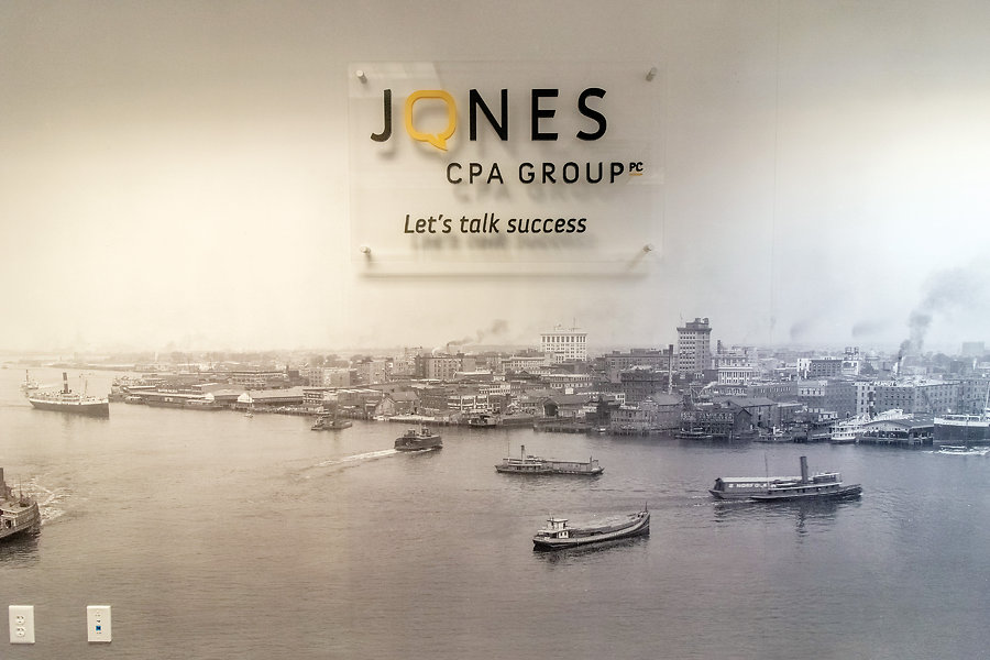The mural on the fourth floor of Jones CPA Groupâ€™s new downtown Norfolk <BR>shows the cityâ€™s bustling waterfront a century ago. <br>Photos by Terry Young - Air Aspects