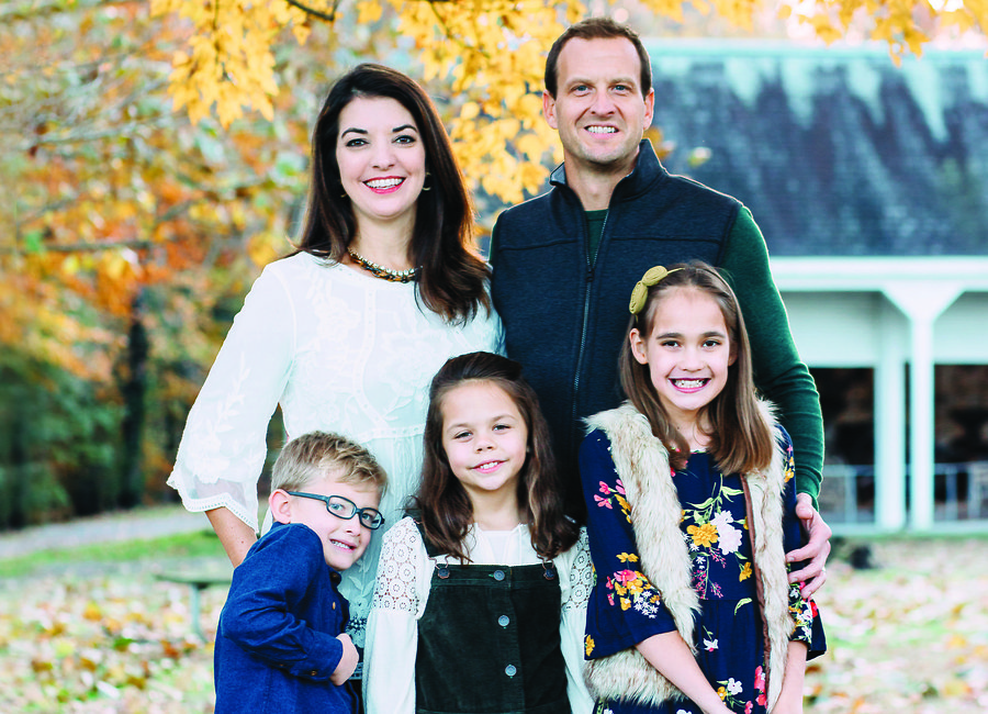 Buddy Smith, owner of Russellâ€™s Heating, Cooling, Plumbing and Electric,<BR> with his wife, Lauren, and their three children: Liam, Jillian and Aly.   <BR>  Photo courtesy of Cara Rosie