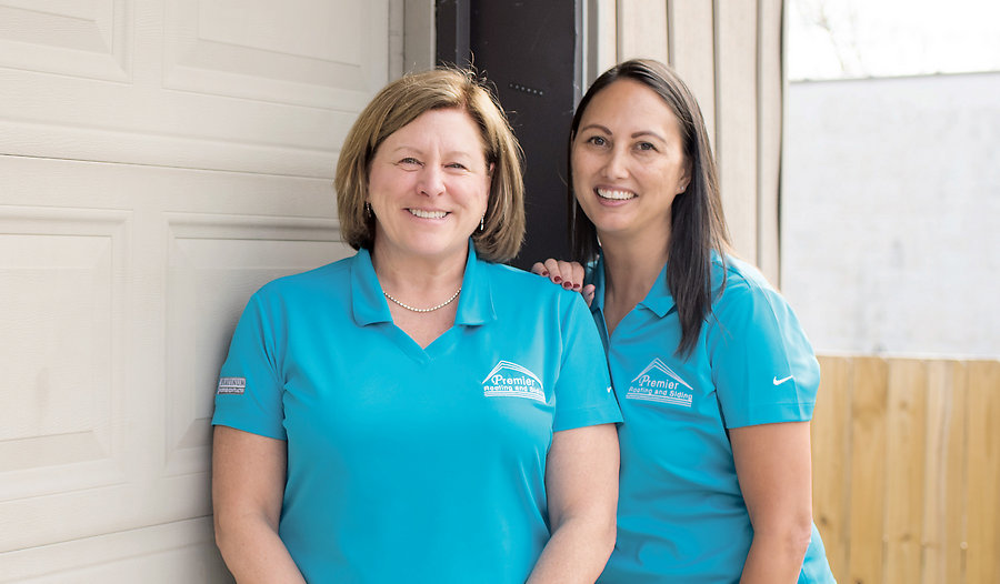 Above, from left: Pam Standish, president and owner of Premier Roofing and Siding, <BR>and Ann Strader, general manager. <BR>Photo by Michele Thompson