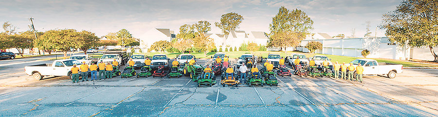The staff of Landscape Plus<BR> includes seven lawn maintenance crews and three installation crews.