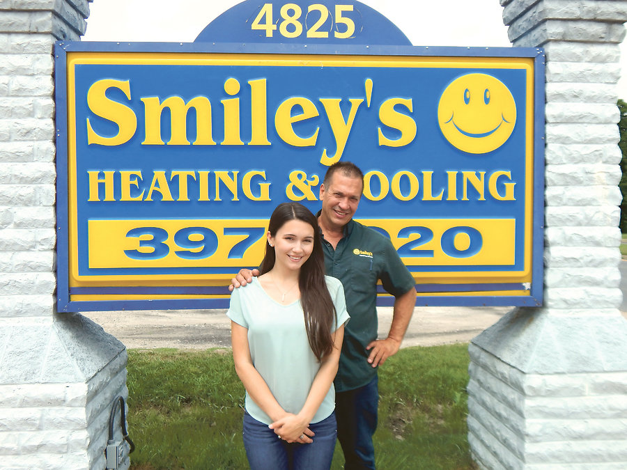 Taylor Smiley, vice president of operations, and Larry Smiley, <BR>owner and president of Smileyâ€™s Heating & Cooling