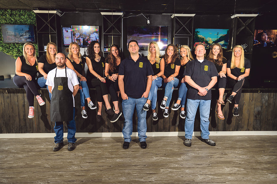 The staff of Tossed and Sauced in Chesapeake