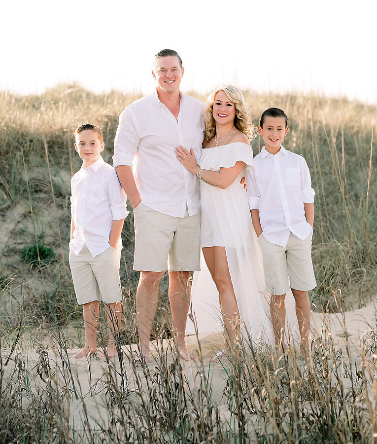 Ben and Janette with their two boys.  <BR>  Photograph by Erika Mills