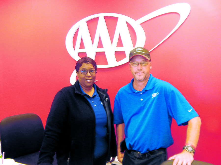 Tasha Tracy and General Manager Mike Granger <BR>greet customers at the AAA Chesapeake Car Care Center.