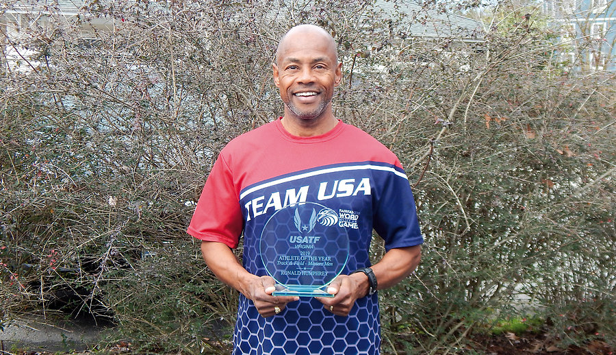 Ronald Humphrey with his USA Track and Field trophy  recognizing him as Virginia 2019 Menâ€™s Master Track and Field Athlete of the Year.