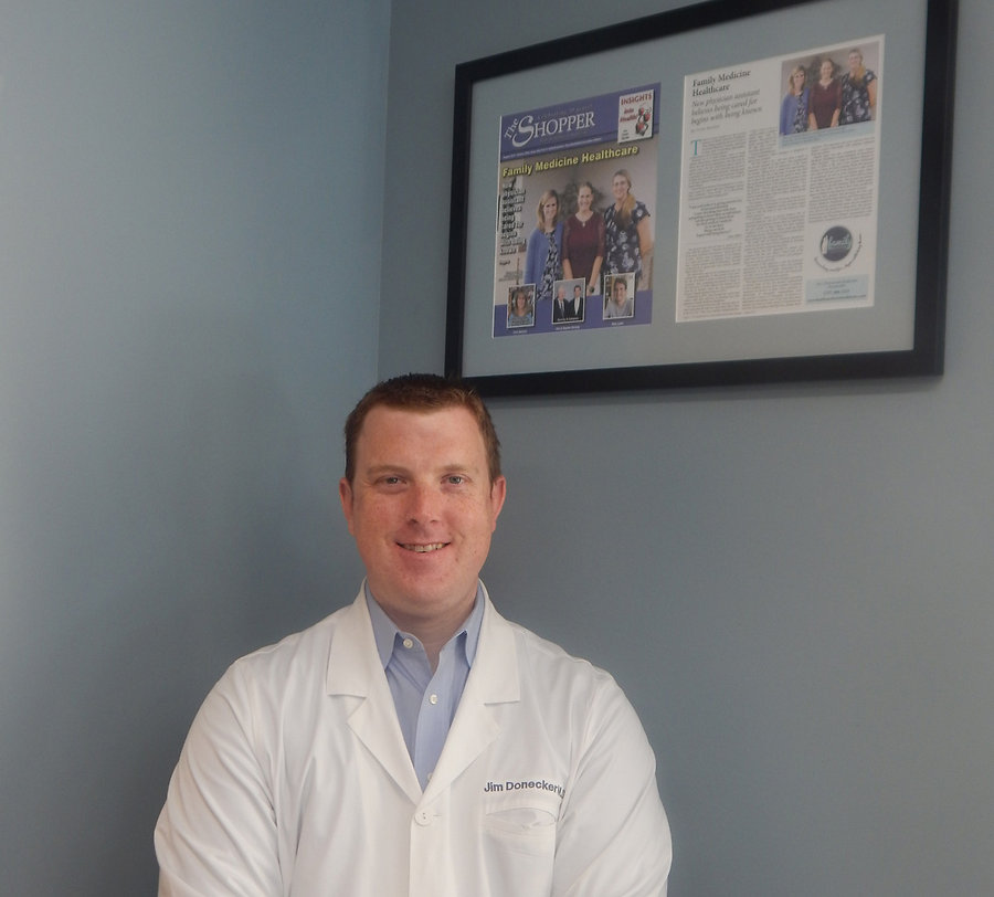 James Donecker, MD with a previous Shopper story displayed in their office