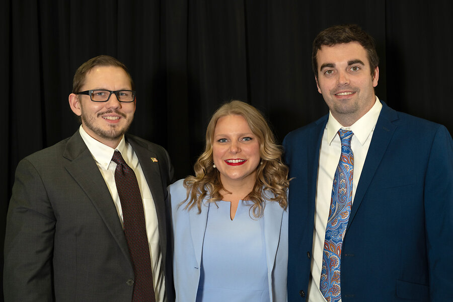 Woman of the Year, Amanda Newins pictured with brother, Nicholas Gregory (left) and husband, Brandon Newins (right)